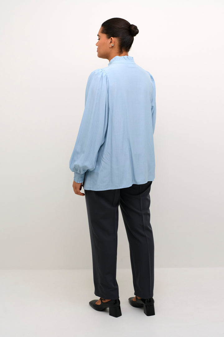 blouse in celestial blue