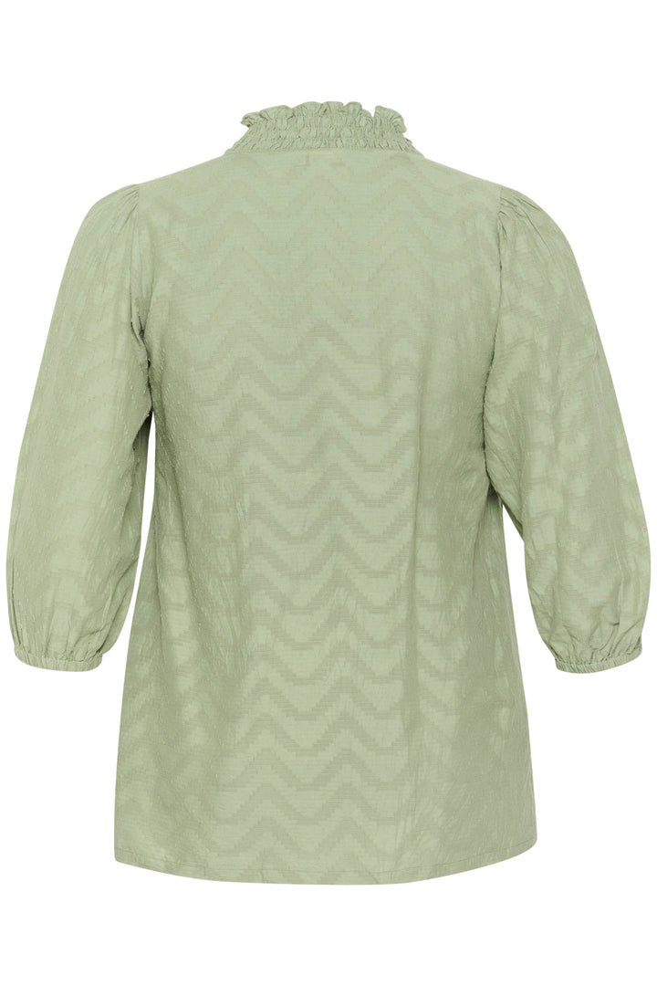 luchtige blouse met zigzagpatroon en ruches