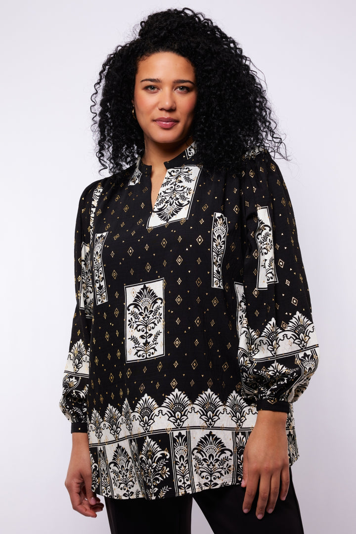 Schwarz-goldene Bluse mit Druckmuster
