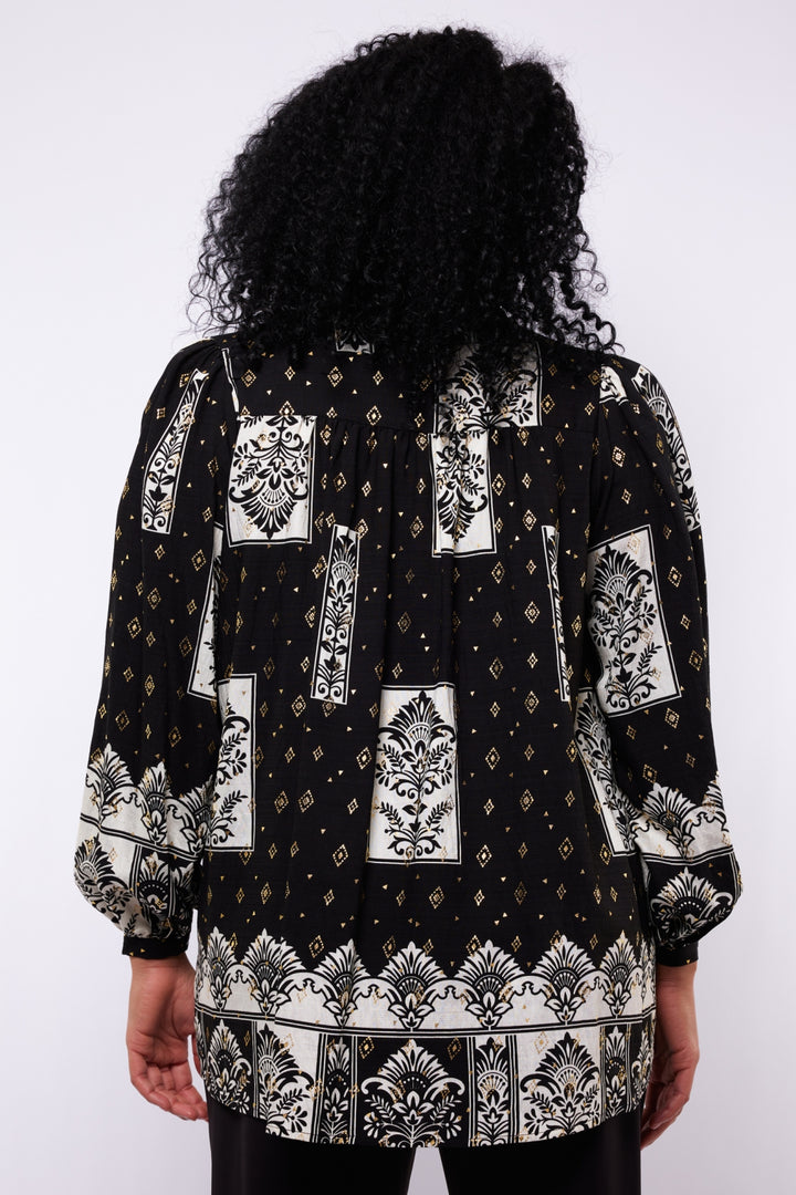 Schwarz-goldene Bluse mit Druckmuster