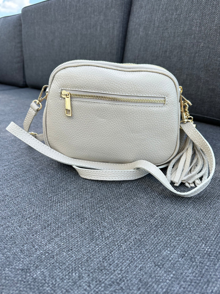 beige leather handbag