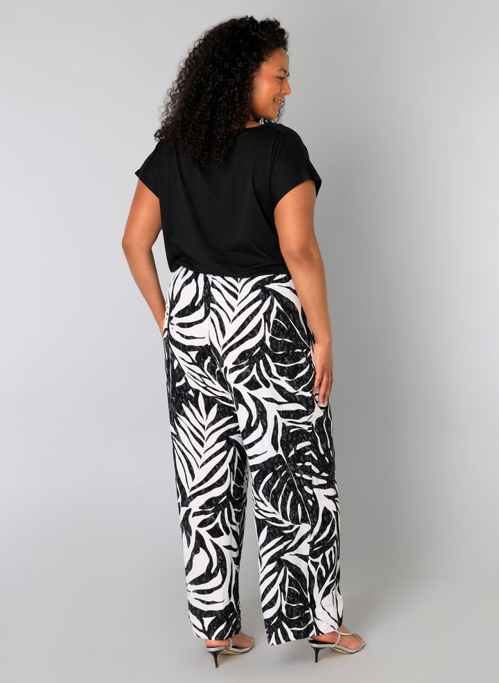 Zwart-witte Broek Met Bladprint