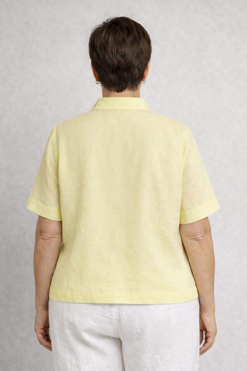 pastelgele blouse met striksluiting