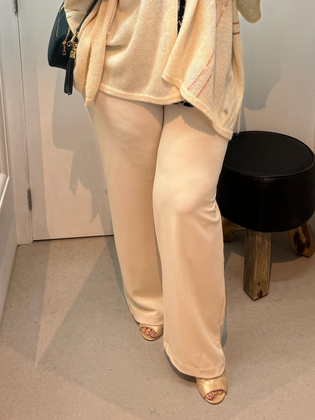 beige wide pants with an elastic waistband