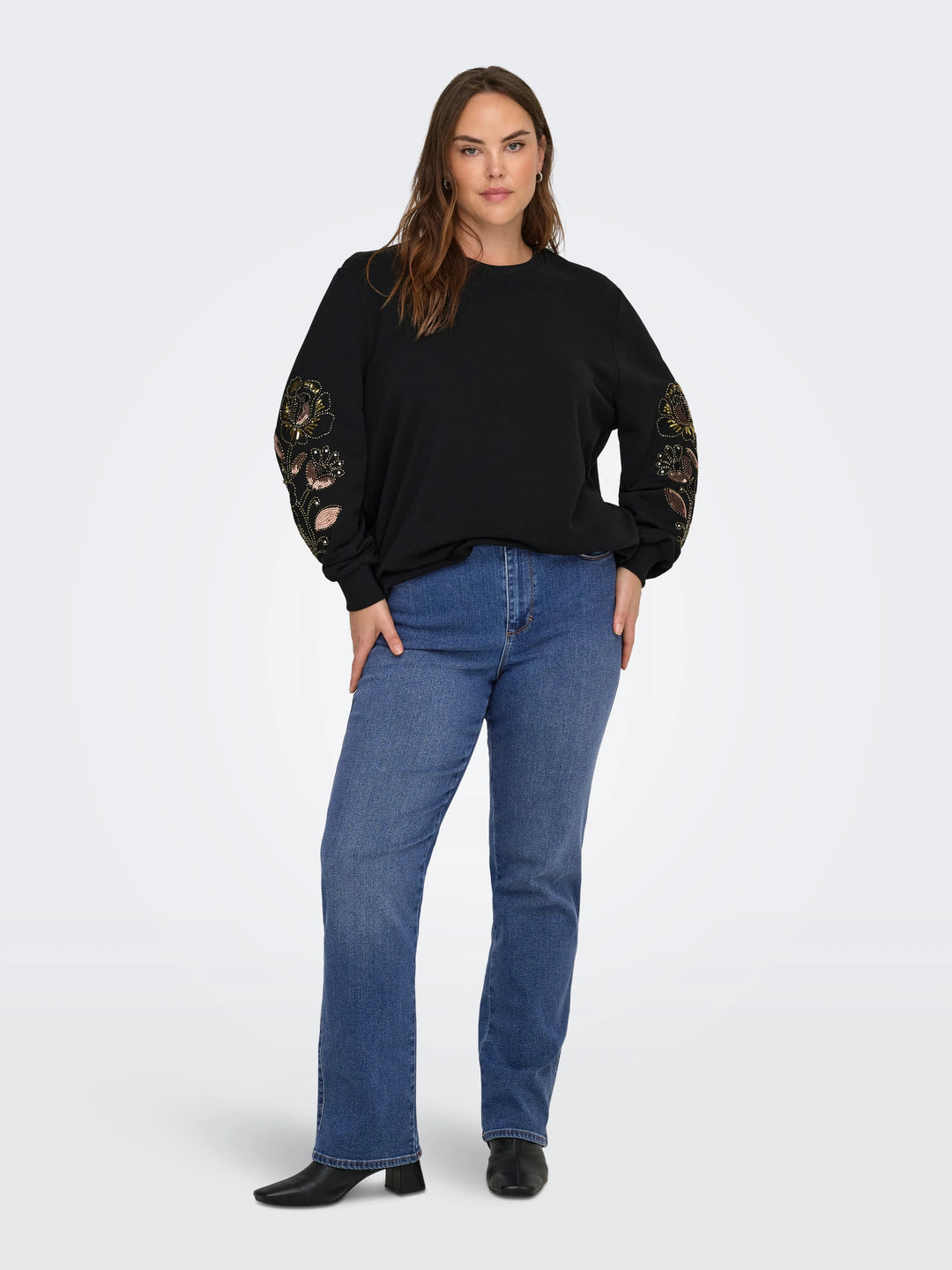 Sweater met pailletten en parels